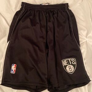 Men’s Adult small Nets basketball shorts.
